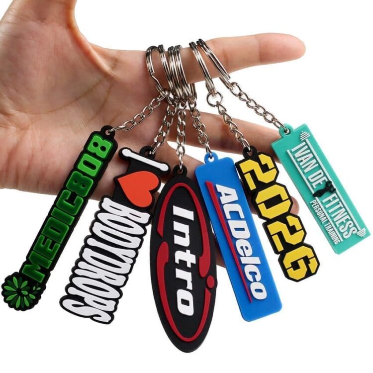 Cheap custom shaped silicone 2d 3d key holder name brand logo soft pvc rubber keychain