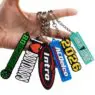 Cheap custom shaped silicone 2d 3d key holder name brand logo soft pvc rubber keychain