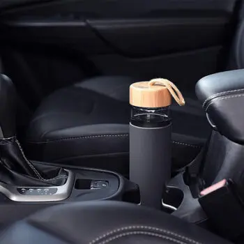 High quality bpa free eco friendly 20 oz borosilicate glass water bottle with bamboo lid and silicone sleeve