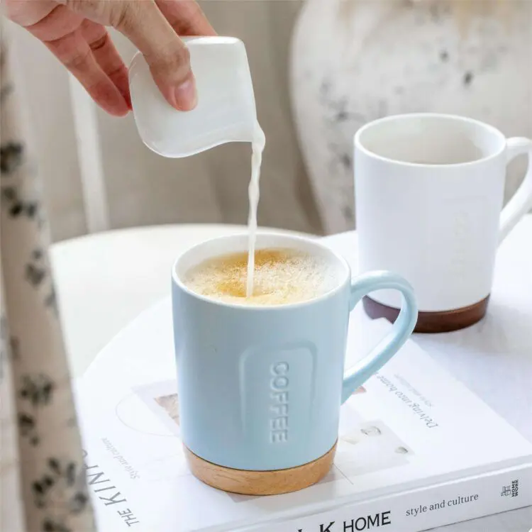 Custom modern and minimalist office with wood cushion relief ceramic coffee cup , ceramic embossed coffee mug with wooden base