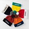 Custom logo jacquard acrylic knitted bobble beanie hat warm winter pom pom beanie