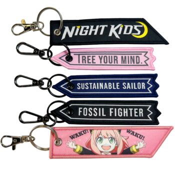 Business promotional items custom slogan logo cute design keychain woven japan jet tag