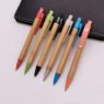Eco green wheat straw materials bamboo wooden ballpoint pen,custom logo laser engraved bamboo ball pen with kraft paper packing