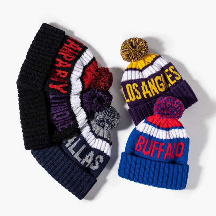 Factory sale jacquard winter sports team bobble hat 100% acrylic warm knitted beanie custom logo