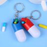mini capsule shaped pill box keychain 1