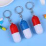 mini capsule shaped pill box keychain 2