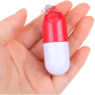 mini capsule shaped pill box keychain