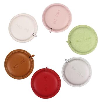 round oil edged leather tape measures